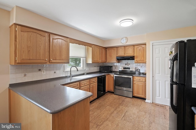 28 Amherst Way, West Windsor, NJ 08550 - kitchen with black appliances, under cabinet range hood, dark countertops, and a peninsula