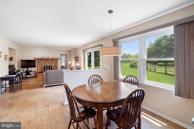 28 Amherst Way, West Windsor, NJ 08550 - dining space with baseboards and a fireplace