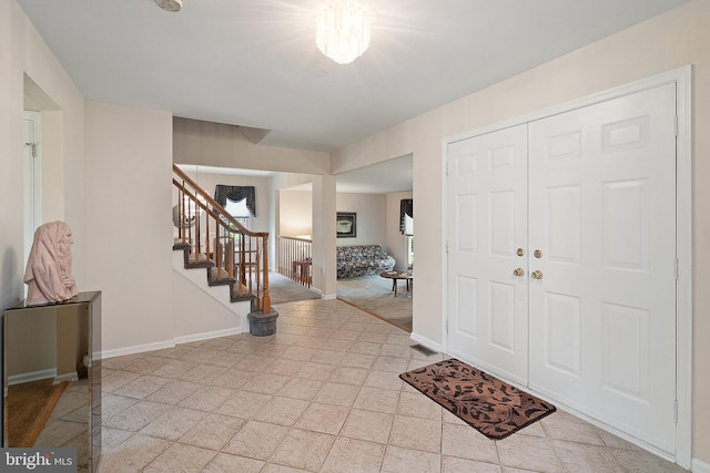 28 Amherst Way, West Windsor, NJ 08550 - foyer entrance featuring stairs and baseboards