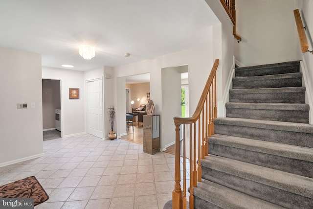 28 Amherst Way, West Windsor, NJ 08550 - staircase featuring baseboards and tile patterned flooring