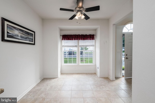12 Juniper Ct Unit 63, Millville, DE 19967 - empty room featuring plenty of natural light, ceiling fan, and light tile patterned floors