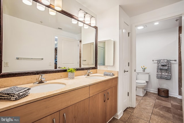 475 K St NW Unit 630, Washington, DC 20001 - bathroom featuring double vanity and tile patterned floors