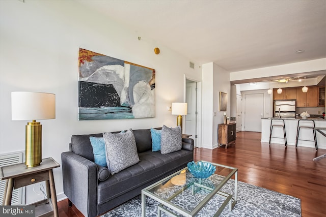475 K St NW Unit 630, Washington, DC 20001 - living room with dark wood finished floors and baseboards