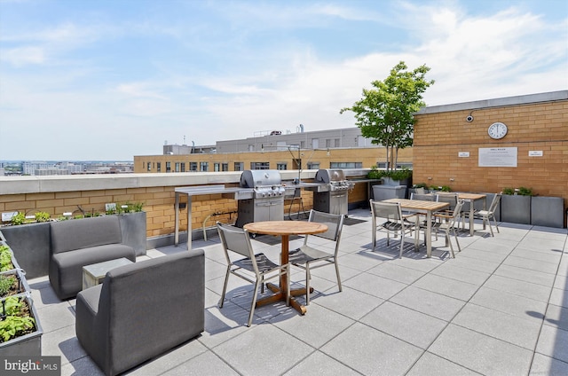 475 K St NW Unit 630, Washington, DC 20001 - view of patio featuring an outdoor kitchen, an outdoor living space, and outdoor dining area
