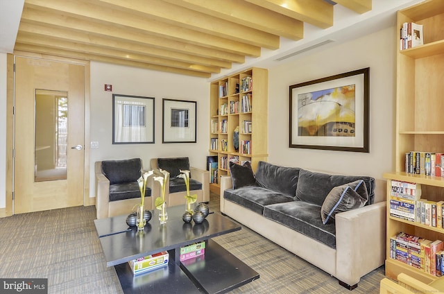 475 K St NW Unit 630, Washington, DC 20001 - carpeted living room with beamed ceiling