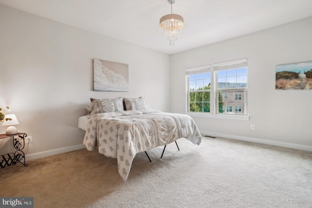 18004 Red Cedar Rd, Dumfries, VA 22026 - bedroom featuring carpet floors and a chandelier