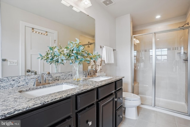 18004 Red Cedar Rd, Dumfries, VA 22026 - full bath with double vanity, a shower stall, and tile patterned floors