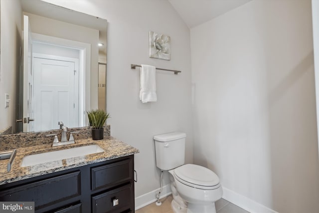 18004 Red Cedar Rd, Dumfries, VA 22026 - bathroom with vanity, tile patterned flooring, and vaulted ceiling