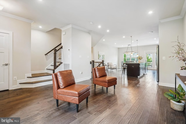 18004 Red Cedar Rd, Dumfries, VA 22026 - living area featuring dark wood-style floors, recessed lighting, stairs, and ornamental molding