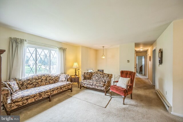 23 Maple St, Ashland, PA 17921 - living area featuring a baseboard radiator and carpet flooring