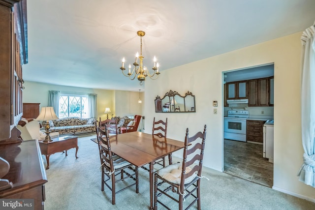 23 Maple St, Ashland, PA 17921 - dining space featuring light colored carpet and a chandelier