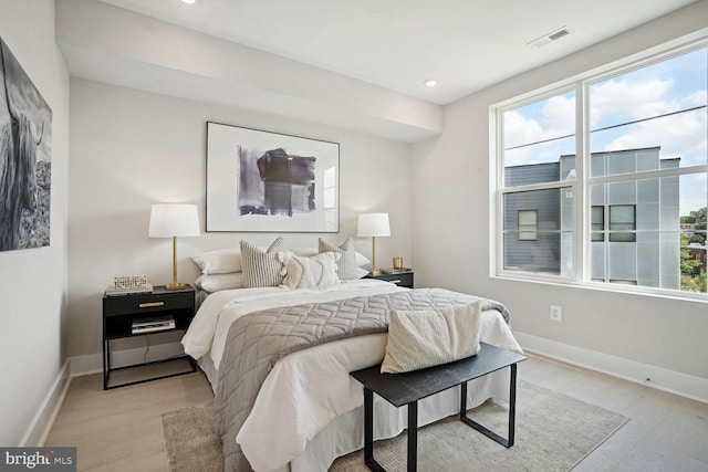 901 19th St NE Unit Ph2, Washington, DC 20002 - bedroom with multiple windows, light wood-style flooring, and recessed lighting