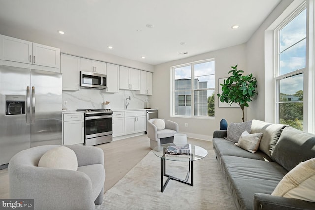 901 19th St NE Unit Ph2, Washington, DC 20002 - living area featuring light wood-type flooring and recessed lighting