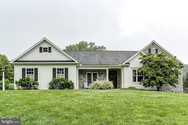10 Elser Hill Rd, Lititz, PA 17543 - view of front of home featuring stone siding, a front yard, and roof with shingles