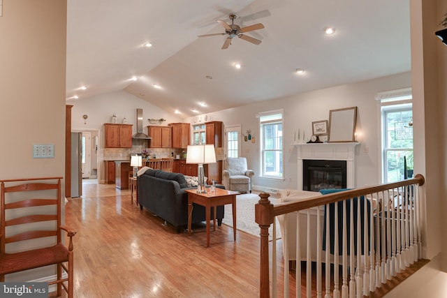 10 Elser Hill Rd, Lititz, PA 17543 - living area featuring a ceiling fan, lofted ceiling, light wood finished floors, and a glass covered fireplace