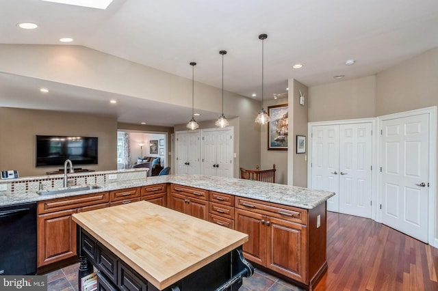 240 Meadow Dr, Haddonfield, NJ 08033 - kitchen with dishwasher, a center island, wood counters, open floor plan, and brown cabinetry