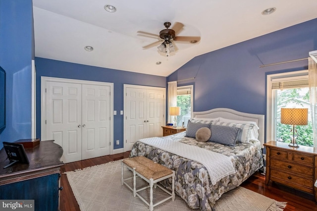 240 Meadow Dr, Haddonfield, NJ 08033 - bedroom with multiple closets, lofted ceiling, multiple windows, wood finished floors, and ceiling fan