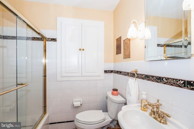 240 Meadow Dr, Haddonfield, NJ 08033 - bathroom featuring combined bath / shower with glass door and wainscoting