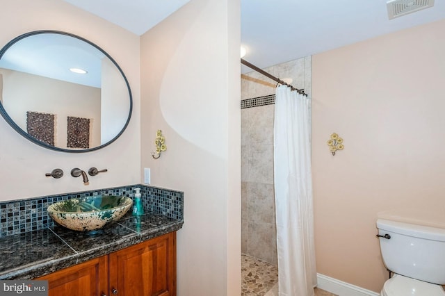 240 Meadow Dr, Haddonfield, NJ 08033 - bathroom with vanity, backsplash, and a tile shower