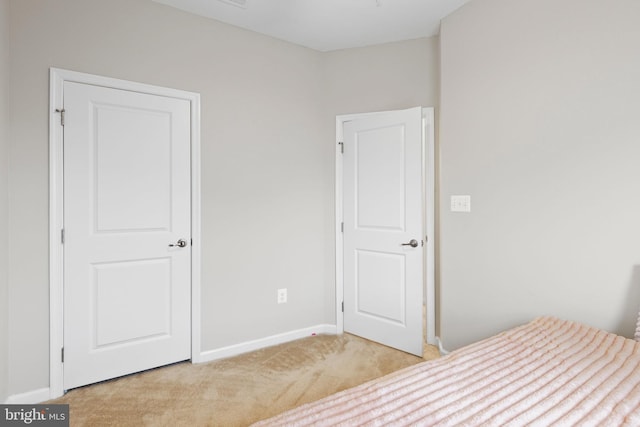 10020 Sandy Run, Baltimore, MD 21220 - unfurnished bedroom featuring light carpet and baseboards