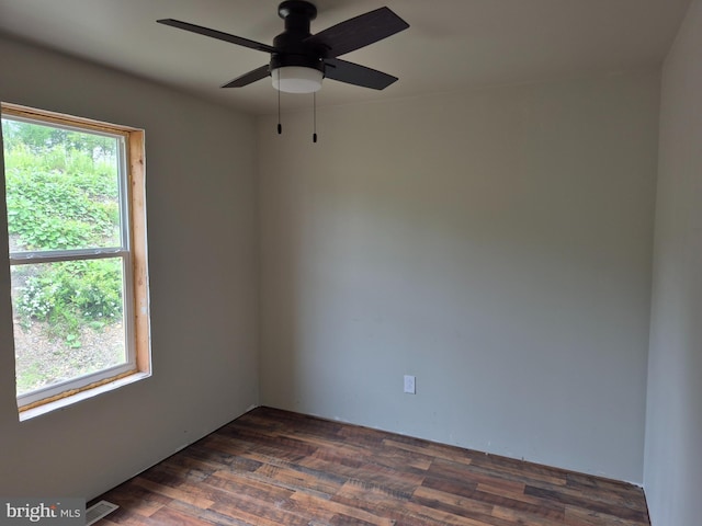 487 Haps Dr, Benezette, PA 15821 - empty room with plenty of natural light, ceiling fan, and dark wood finished floors