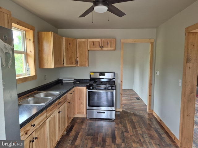 487 Haps Dr, Benezette, PA 15821 - kitchen featuring stainless steel gas range oven, light brown cabinets, dark wood-type flooring, and dark countertops