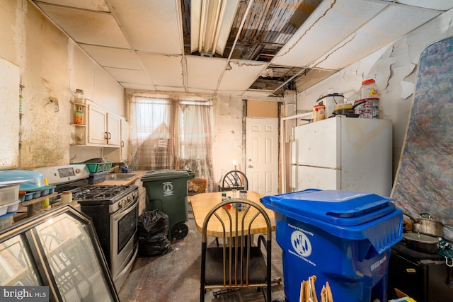 2560 W Fairmount Ave, Baltimore, MD 21223 - basement featuring freestanding refrigerator