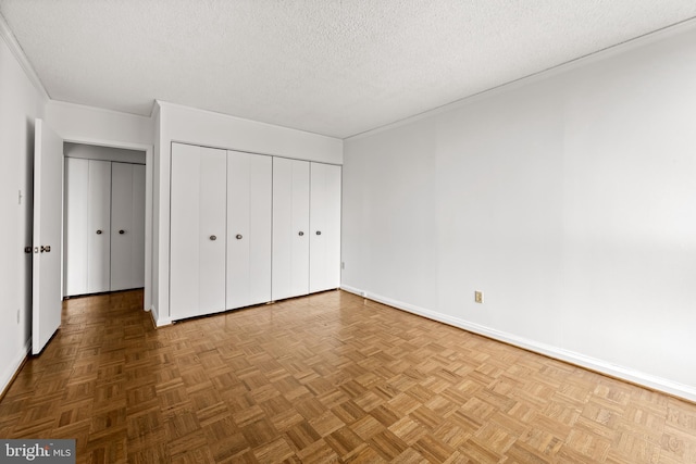 4100 N Charles St N Unit 803, Baltimore, MD 21218 - unfurnished bedroom featuring a textured ceiling and a closet