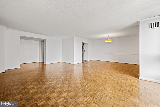 4100 N Charles St N Unit 803, Baltimore, MD 21218 - empty room with baseboards and a textured ceiling