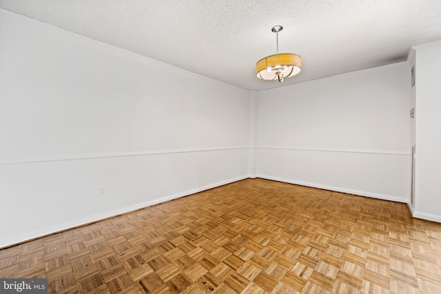 4100 N Charles St N Unit 803, Baltimore, MD 21218 - empty room with baseboards and a textured ceiling