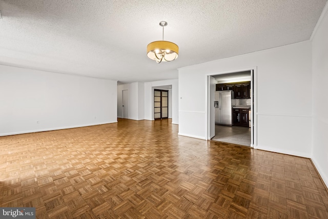 4100 N Charles St N Unit 803, Baltimore, MD 21218 - empty room featuring a textured ceiling