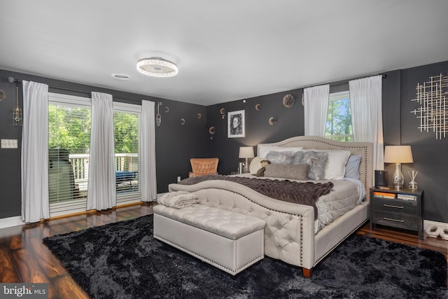 18424 Horseshoe Bend Rd, Sharpsburg, MD 21782 - bedroom featuring multiple windows, access to outside, and wood finished floors