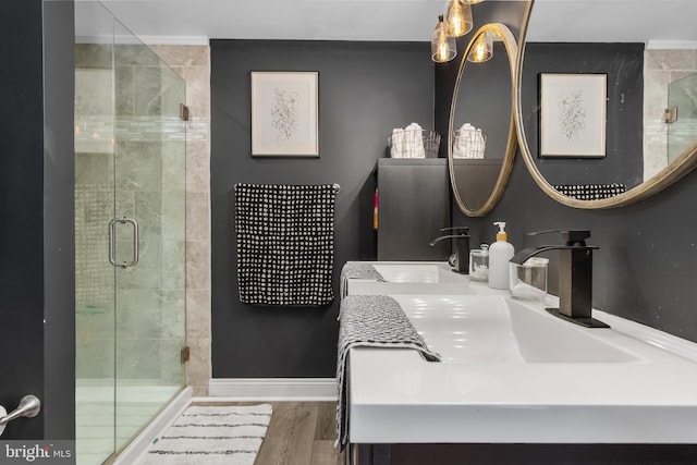 18424 Horseshoe Bend Rd, Sharpsburg, MD 21782 - bathroom with a stall shower, double vanity, and wood finished floors