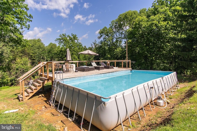 18424 Horseshoe Bend Rd, Sharpsburg, MD 21782 - swimming pool with a wooden deck, stairs, view of scattered trees, and outdoor lounge area
