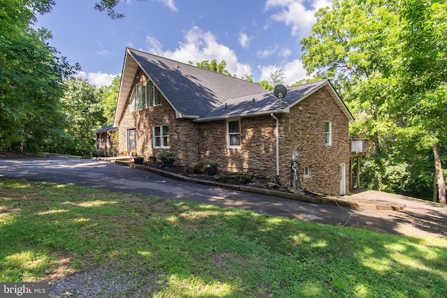 18424 Horseshoe Bend Rd, Sharpsburg, MD 21782 - view of home's exterior with a shingled roof, stone siding, and a lawn