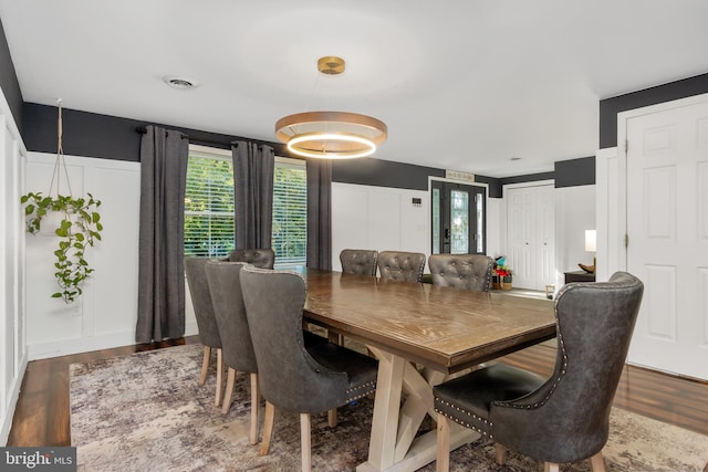 18424 Horseshoe Bend Rd, Sharpsburg, MD 21782 - dining room with wood finished floors, healthy amount of natural light, and a decorative wall