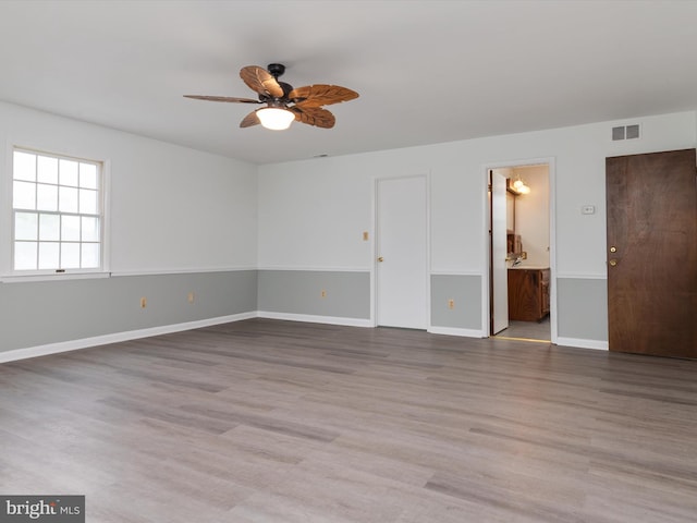 715 Griffith Rd, Glen Burnie, MD 21061 - empty room featuring a ceiling fan and wood finished floors