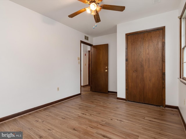 715 Griffith Rd, Glen Burnie, MD 21061 - unfurnished bedroom with light wood finished floors, a closet, and ceiling fan