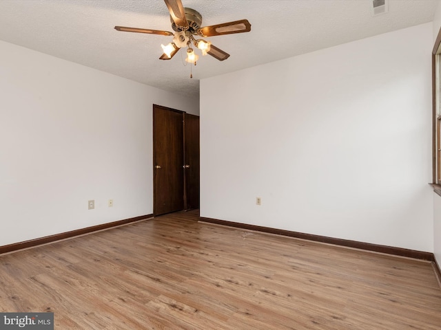 715 Griffith Rd, Glen Burnie, MD 21061 - unfurnished room with light wood-type flooring, a ceiling fan, and a textured ceiling