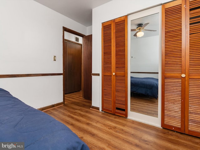 715 Griffith Rd, Glen Burnie, MD 21061 - unfurnished bedroom featuring wood finished floors and two closets