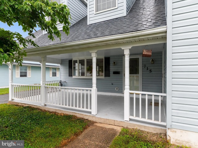 715 Griffith Rd, Glen Burnie, MD 21061 - entrance to property featuring covered porch and roof with shingles
