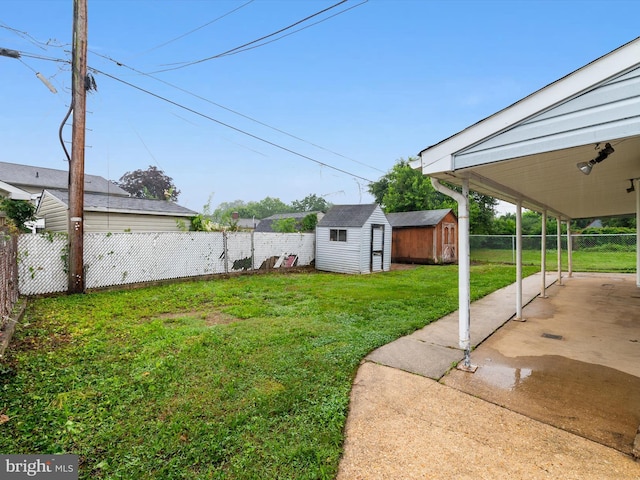 715 Griffith Rd, Glen Burnie, MD 21061 - fenced backyard with a storage shed and a patio