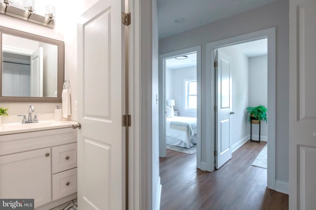 1616 C St NE, Washington, DC 20002 - ensuite bathroom with vanity and wood finished floors