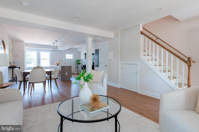 1616 C St NE, Washington, DC 20002 - living room featuring wood finished floors, stairs, and recessed lighting