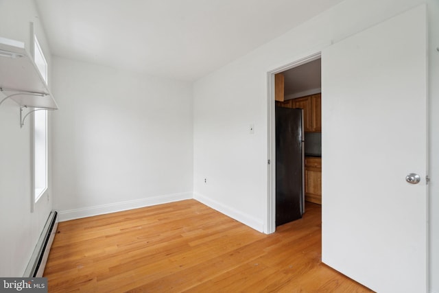 2016 Christian St Unit C, Philadelphia, PA 19146 - empty room featuring baseboard heating and light wood-style flooring