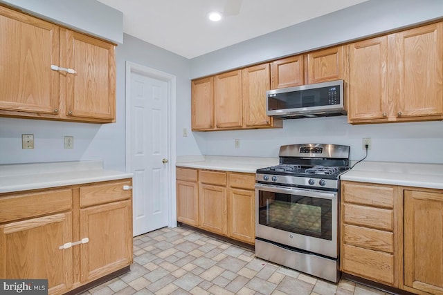 6483 Sedgwick St, Elkridge, MD 21075 - kitchen with appliances with stainless steel finishes, light countertops, and light brown cabinetry