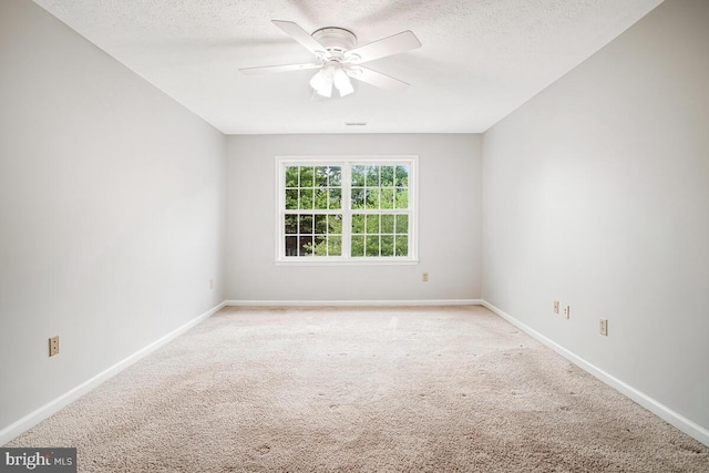 6483 Sedgwick St, Elkridge, MD 21075 - empty room featuring light colored carpet, ceiling fan, and a textured ceiling