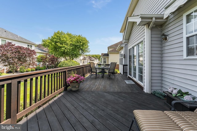 7 Colts Ln, Flemington, NJ 08822 - wooden deck with outdoor dining space and a residential view