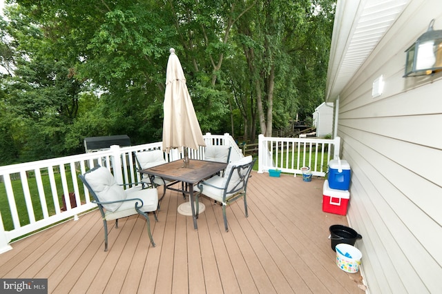 505 Northview Rd, Mount Airy, MD 21771 - wooden terrace featuring outdoor dining space and view of wooded area
