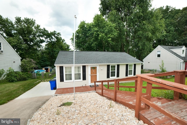 505 Northview Rd, Mount Airy, MD 21771 - ranch-style home with roof with shingles, a front yard, a wooden deck, and view of scattered trees